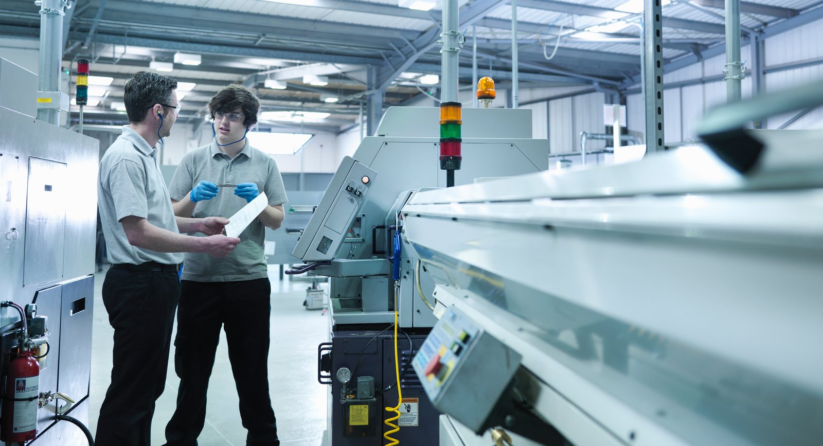 Two engineers in facility
